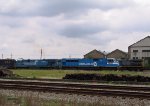 CSX 811 & 7116 lead an inbound train past the Emerson Shops